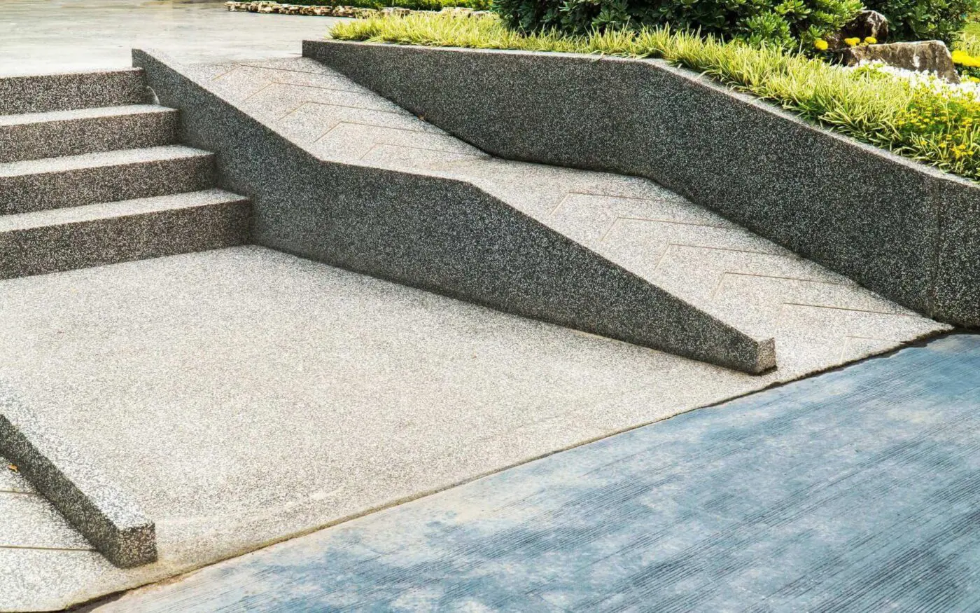 a ramp is installed beside the stairs for people with disability