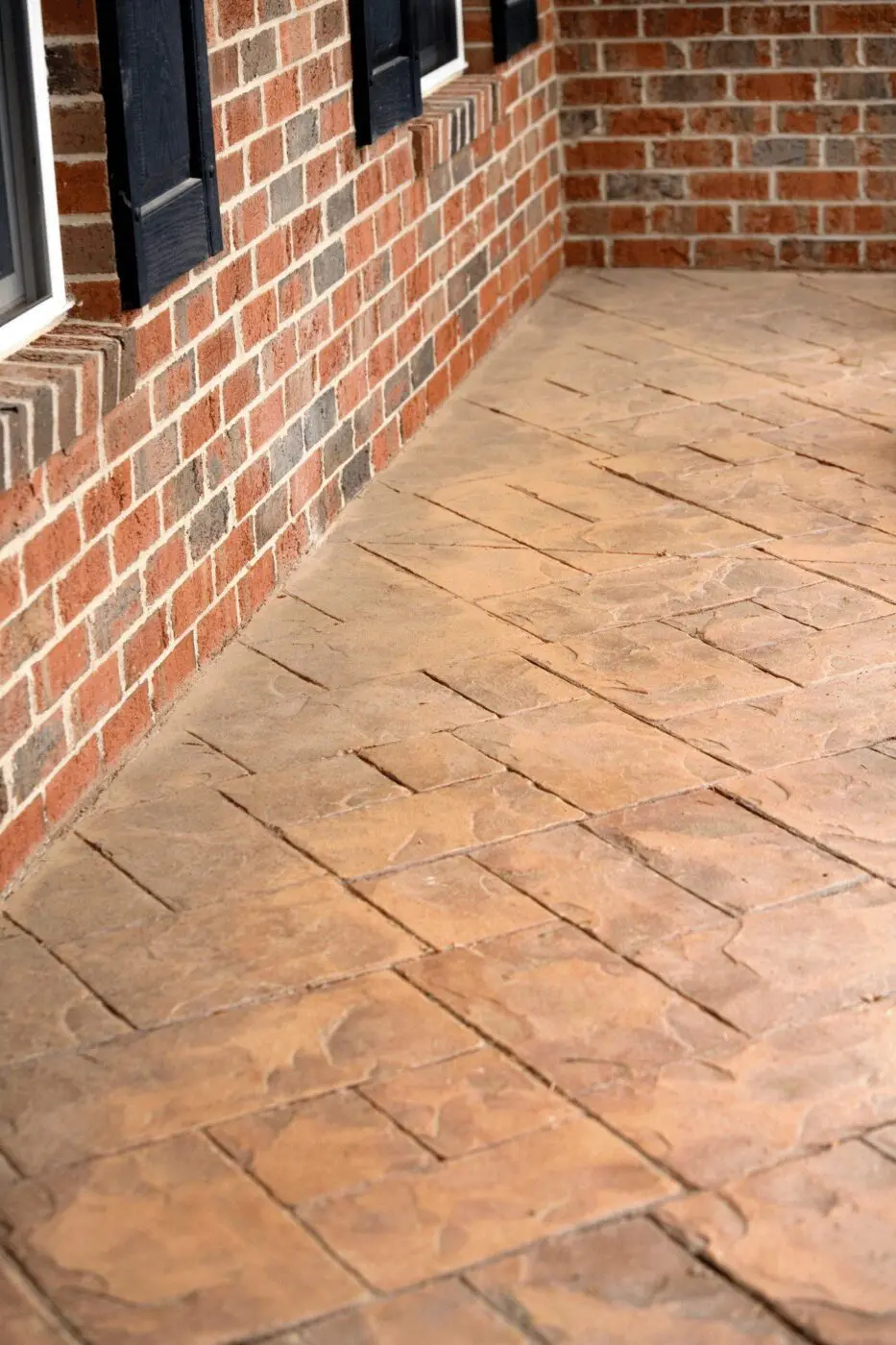 orange stamped concrete brick look patio freshly installed at a home in Sparks Nevada