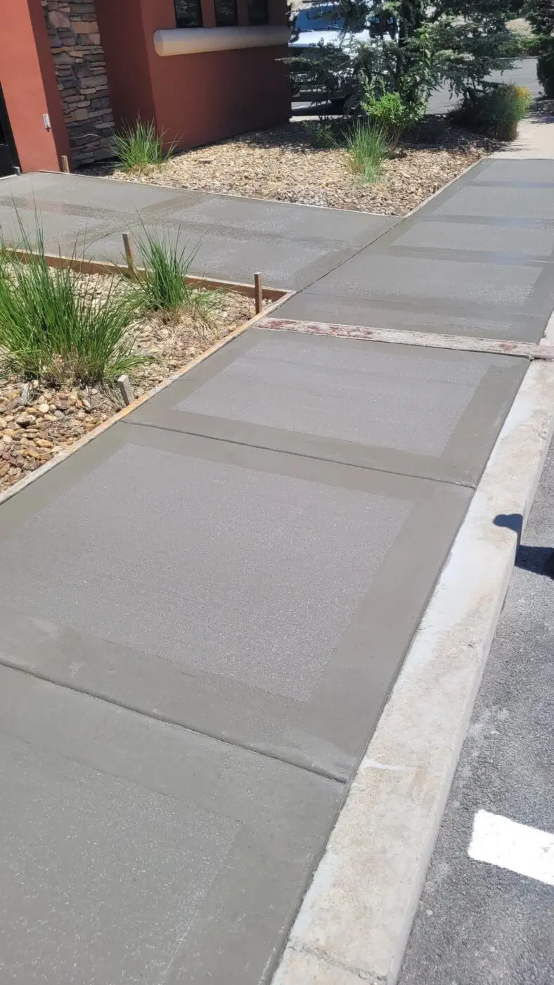 concrete sidewalk in grey color, freshly installed by Reno Concrete Solutions