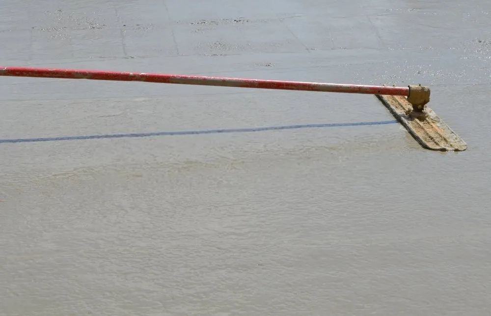 a concrete leveling tool is used to create a smooth surface finish