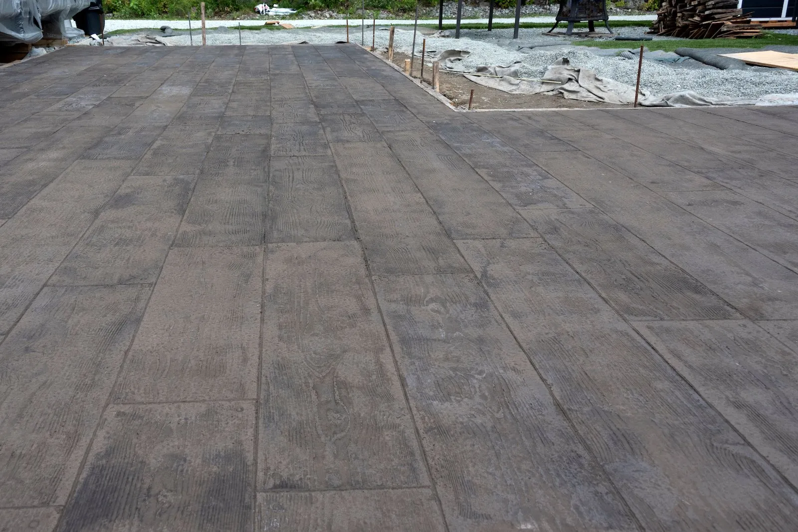 wood look stamped concrete pool deck laid at a home in Sparks Nevada